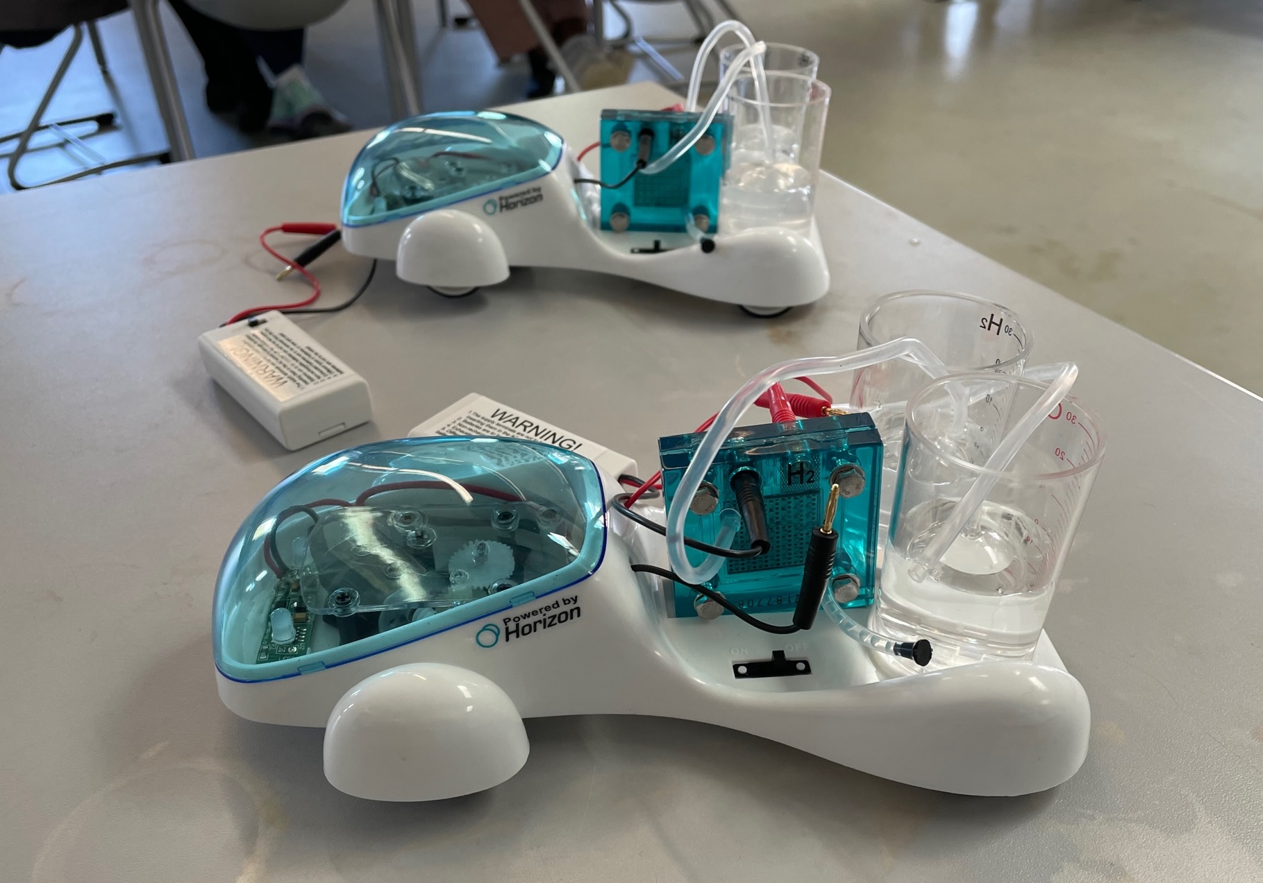 Two small water-powered vehicles