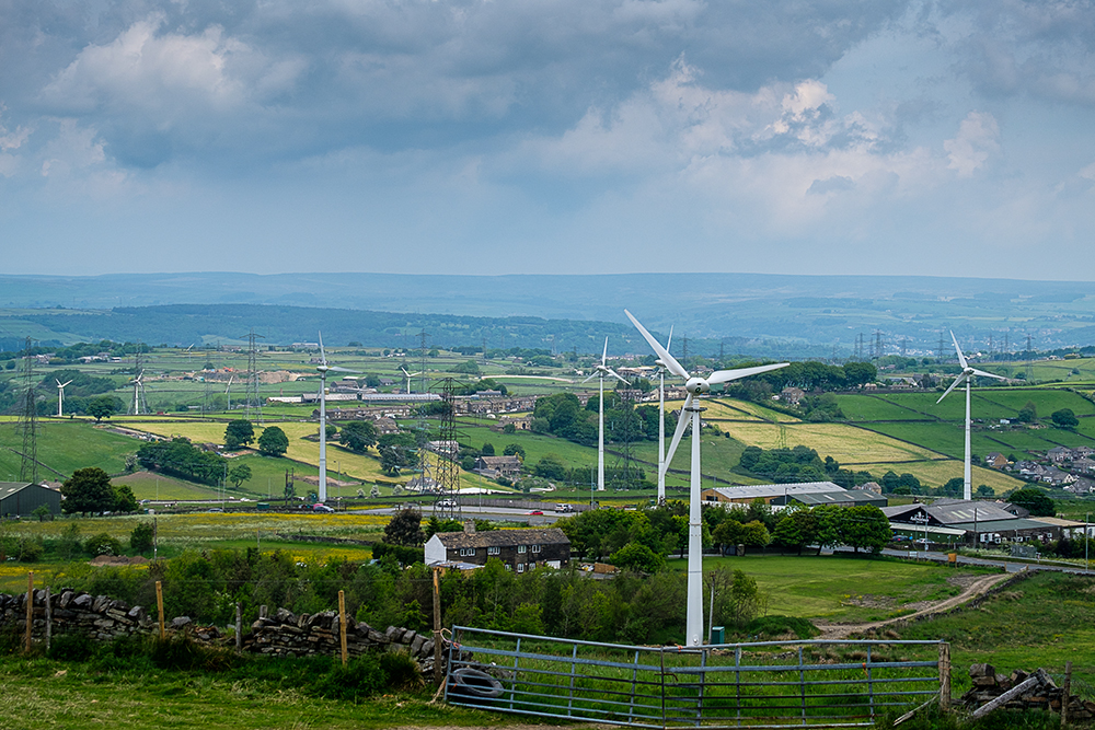 A view of the countryside with wind turbines