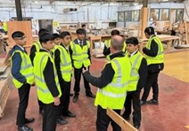 A group of young people wearing high vis jackets