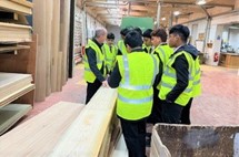 A group of young people wearing high vis jackets