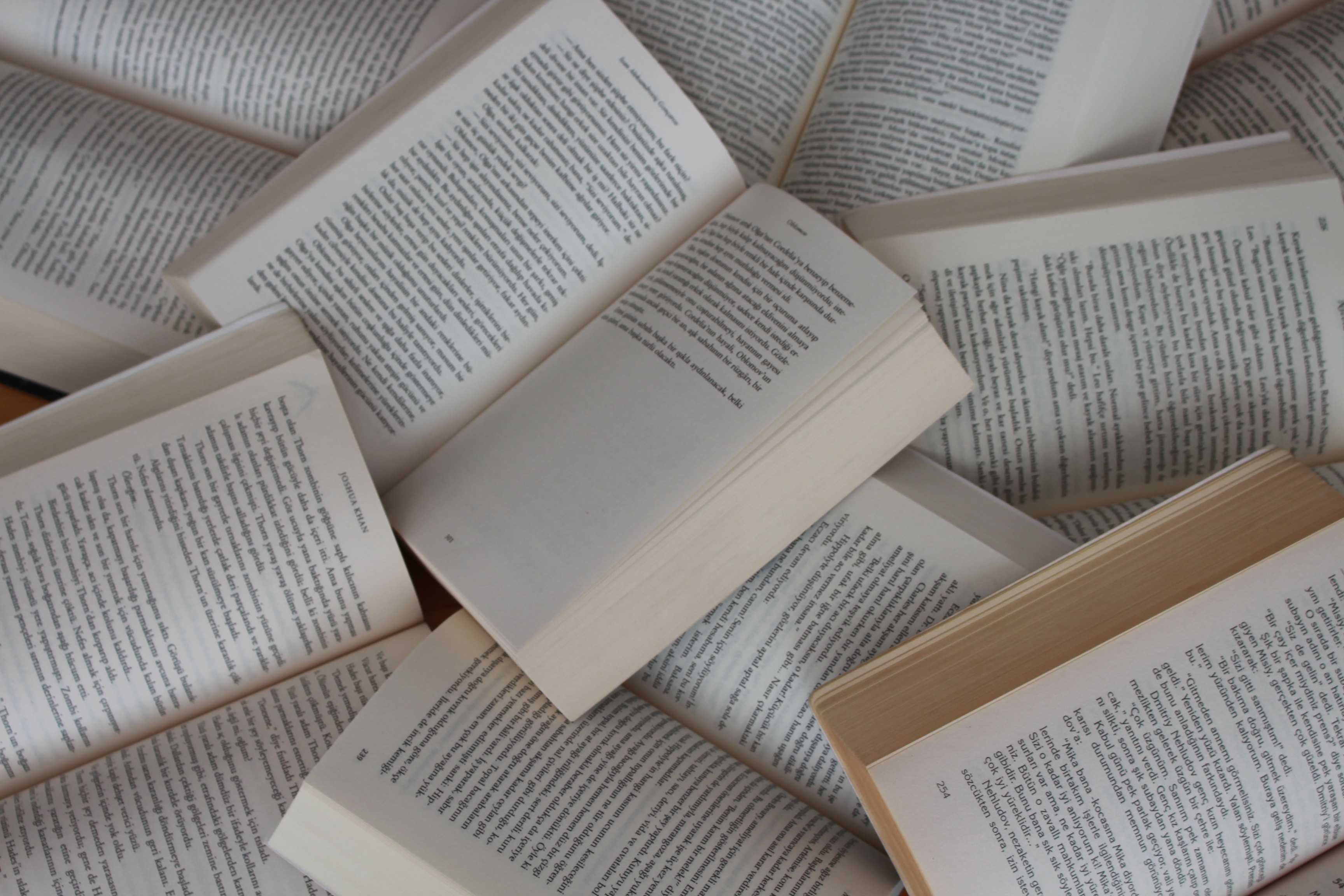 A pile of open books